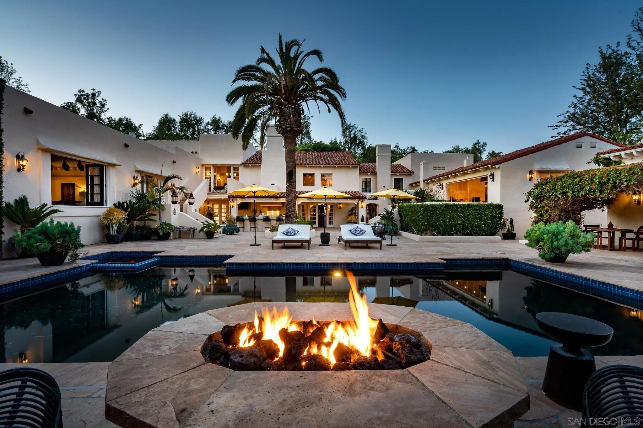 a view of a swimming pool with a patio
