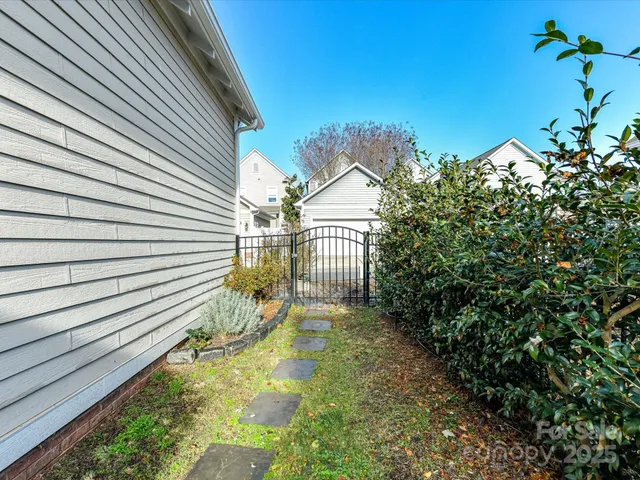 a view of a house with a flower plants