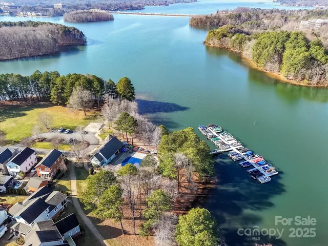 an aerial view of lake residential house with outdoor space