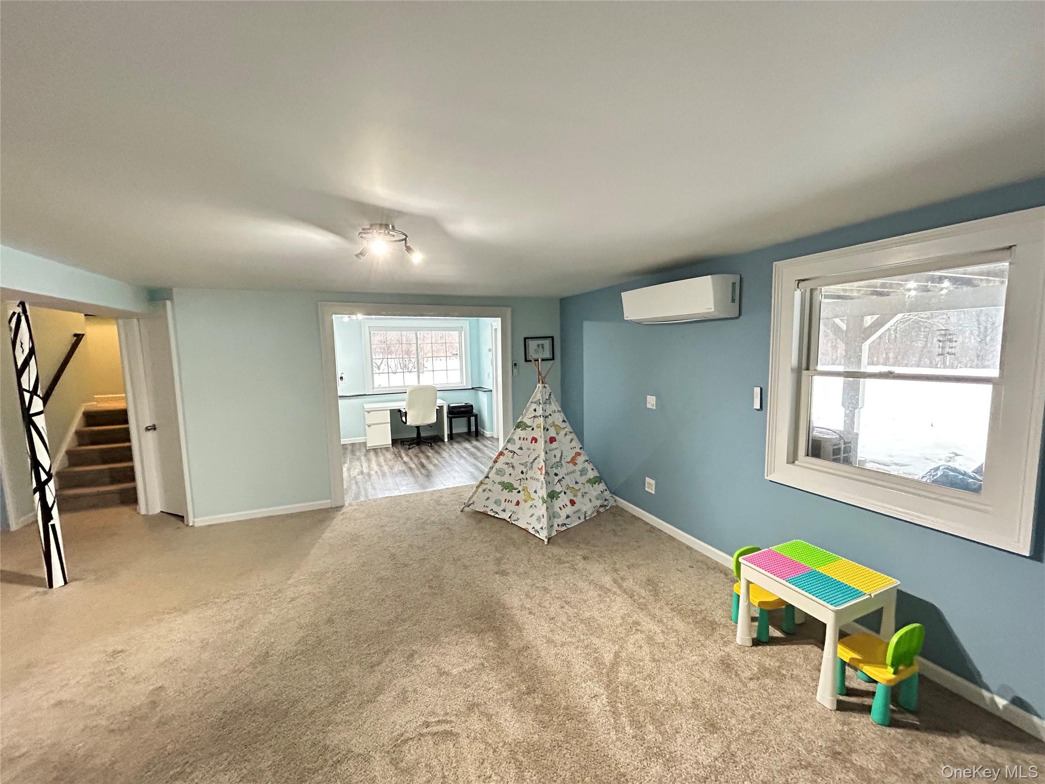 53 Daly Road Middletown, NY 10940 - Photo 23 of 27 a living room with furniture and a wooden floor