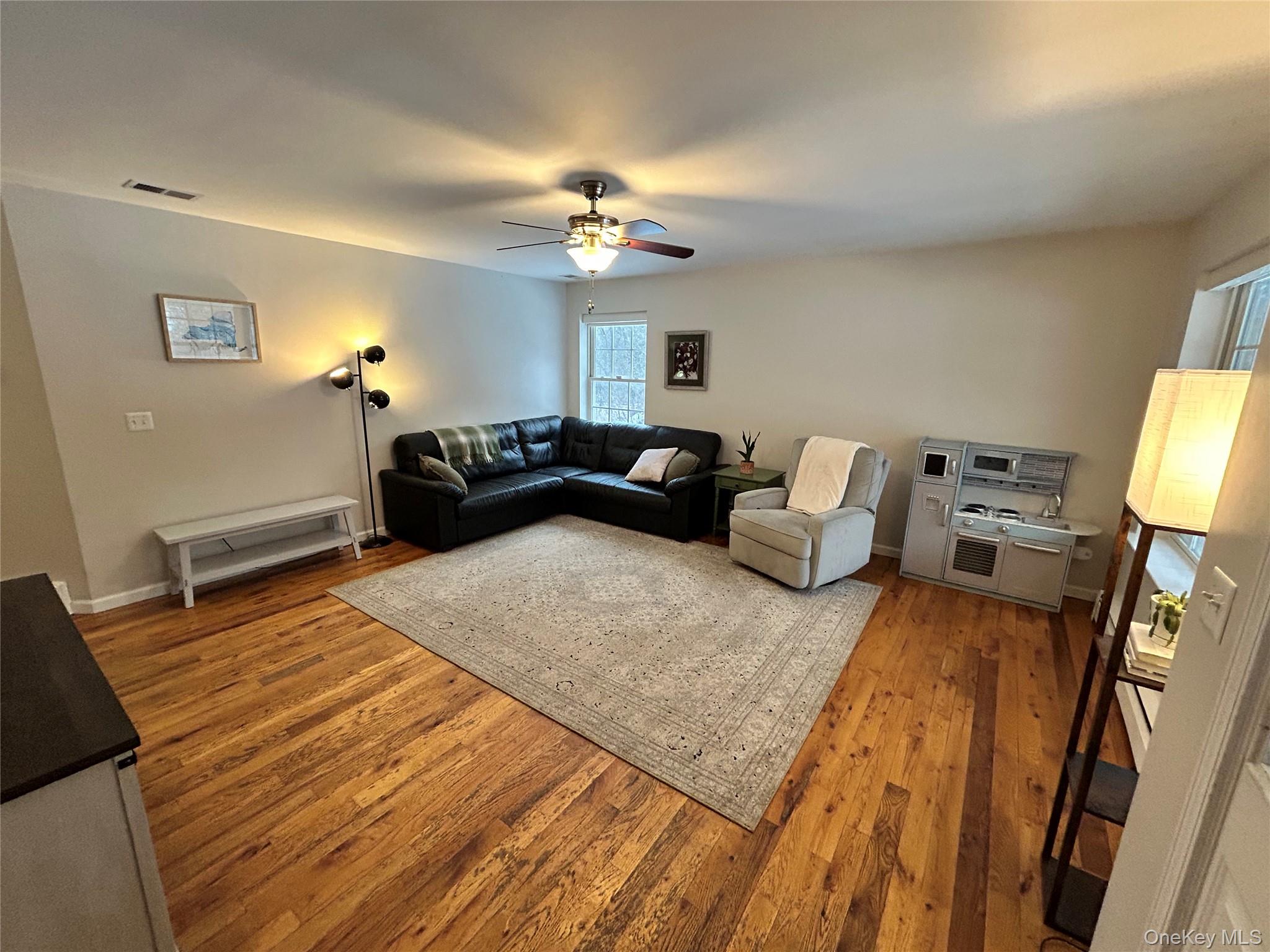 53 Daly Road Middletown, NY 10940 - Photo 6 of 27 a living room with furniture and a flat screen tv