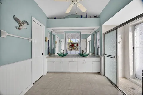 a kitchen with stainless steel appliances a refrigerator and a sink
