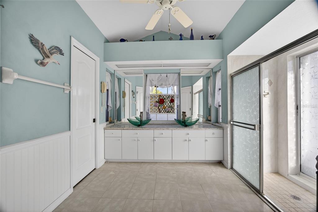 1421 Rio De Janeiro Avenue Punta Gorda, FL 33983 - Photo 15 of 34 a kitchen with stainless steel appliances a refrigerator and a sink