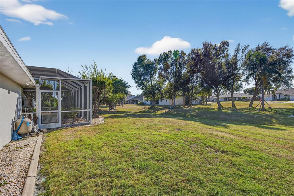 1421 Rio De Janeiro Avenue Punta Gorda, FL 33983 - Photo 28 of 34 a view of swimming pool with outdoor seating and plants