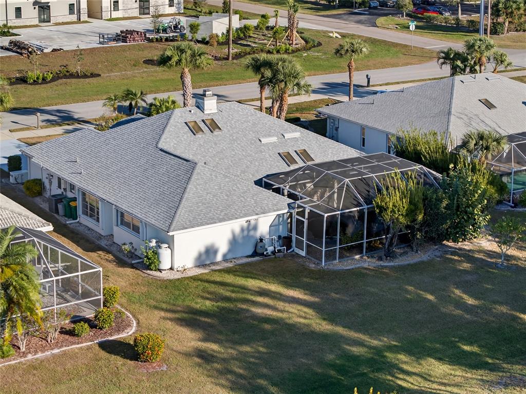 1421 Rio De Janeiro Avenue Punta Gorda, FL 33983 - Photo 29 of 34 an aerial view of a house with a yard