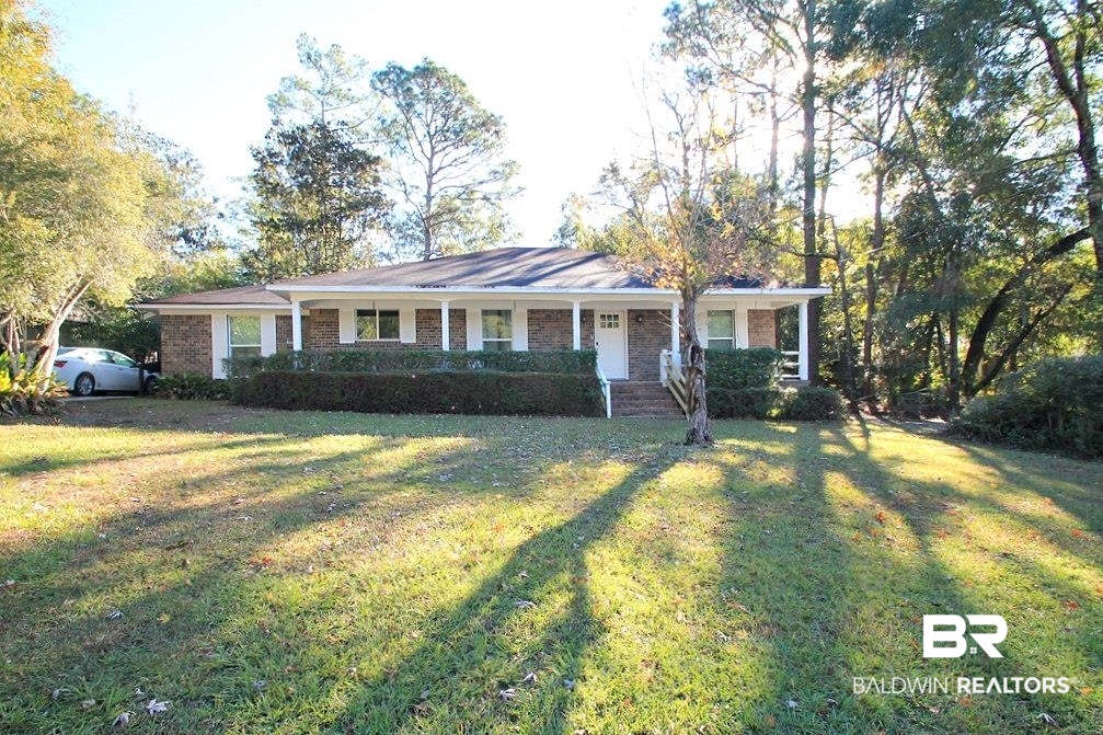 205 Montclair Loop Daphne, AL 36526 - Photo 1 of 19 Ranch-style home featuring a front yard