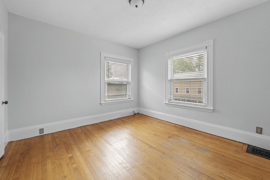 47 Cedar Street Malden, MA 02148 - Photo 16 of 24 a view of empty room with wooden floor and fan