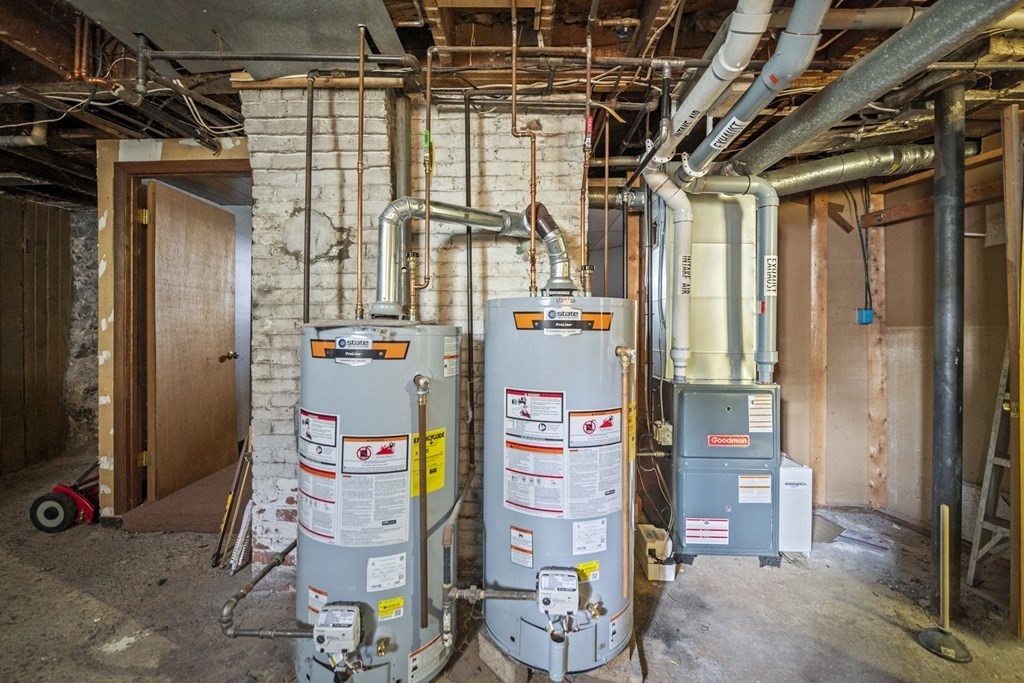 47 Cedar Street Malden, MA 02148 - Photo 22 of 24 a utility room with dryer and washer