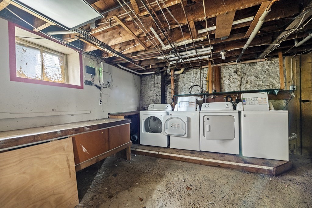 47 Cedar Street Malden, MA 02148 - Photo 23 of 24 a utility room with dryer and washer
