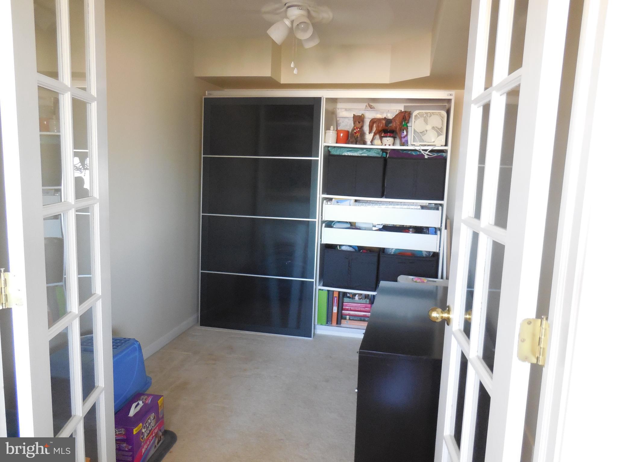 5101 8th Road South, Unit 404 Arlington, VA 22204 - Photo 14 of 27 Huge den with storage
