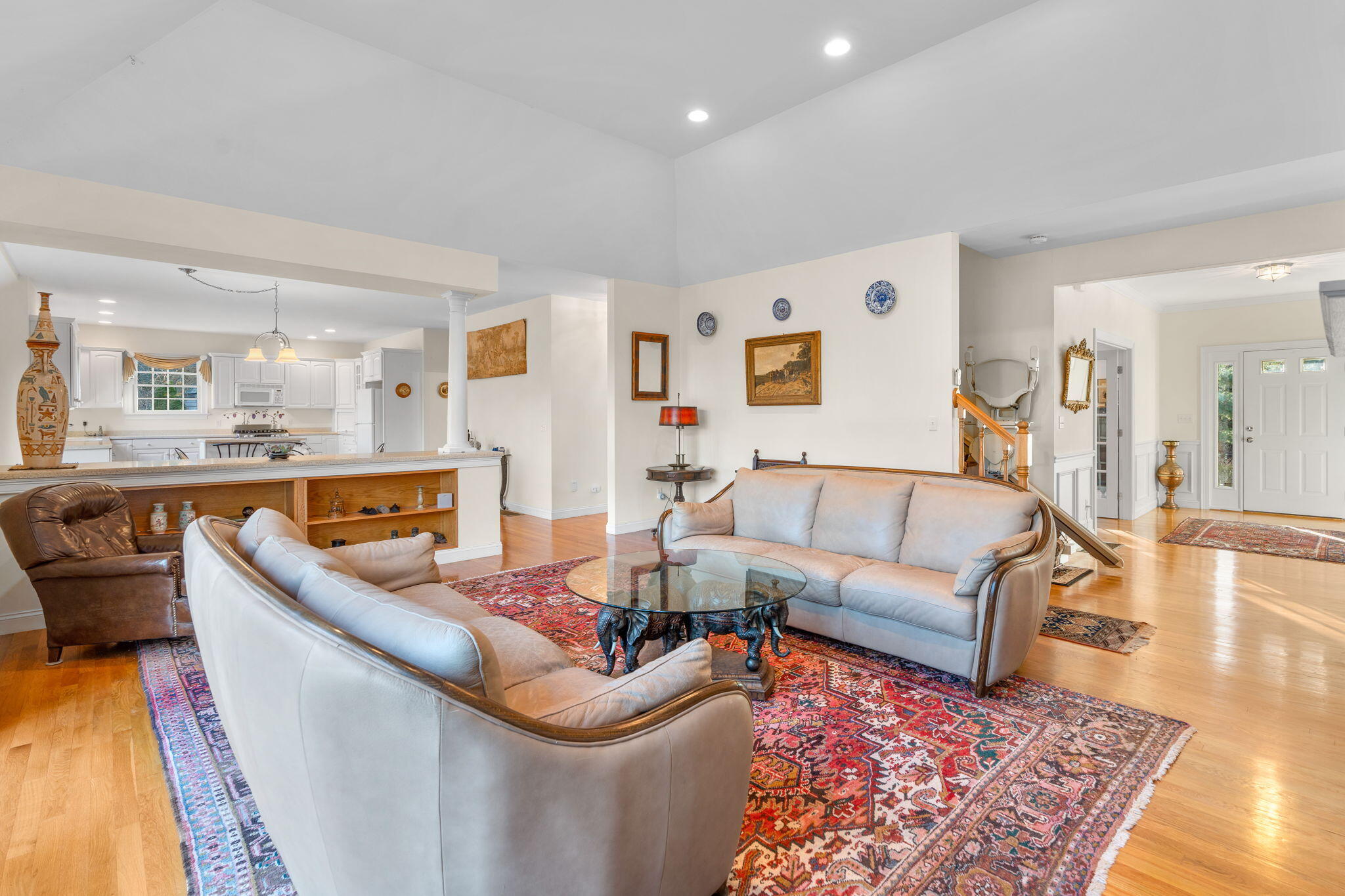 208 Rock Landing Road Mashpee, MA 02649 - Photo 12 of 32 a living room with furniture and a wooden floor