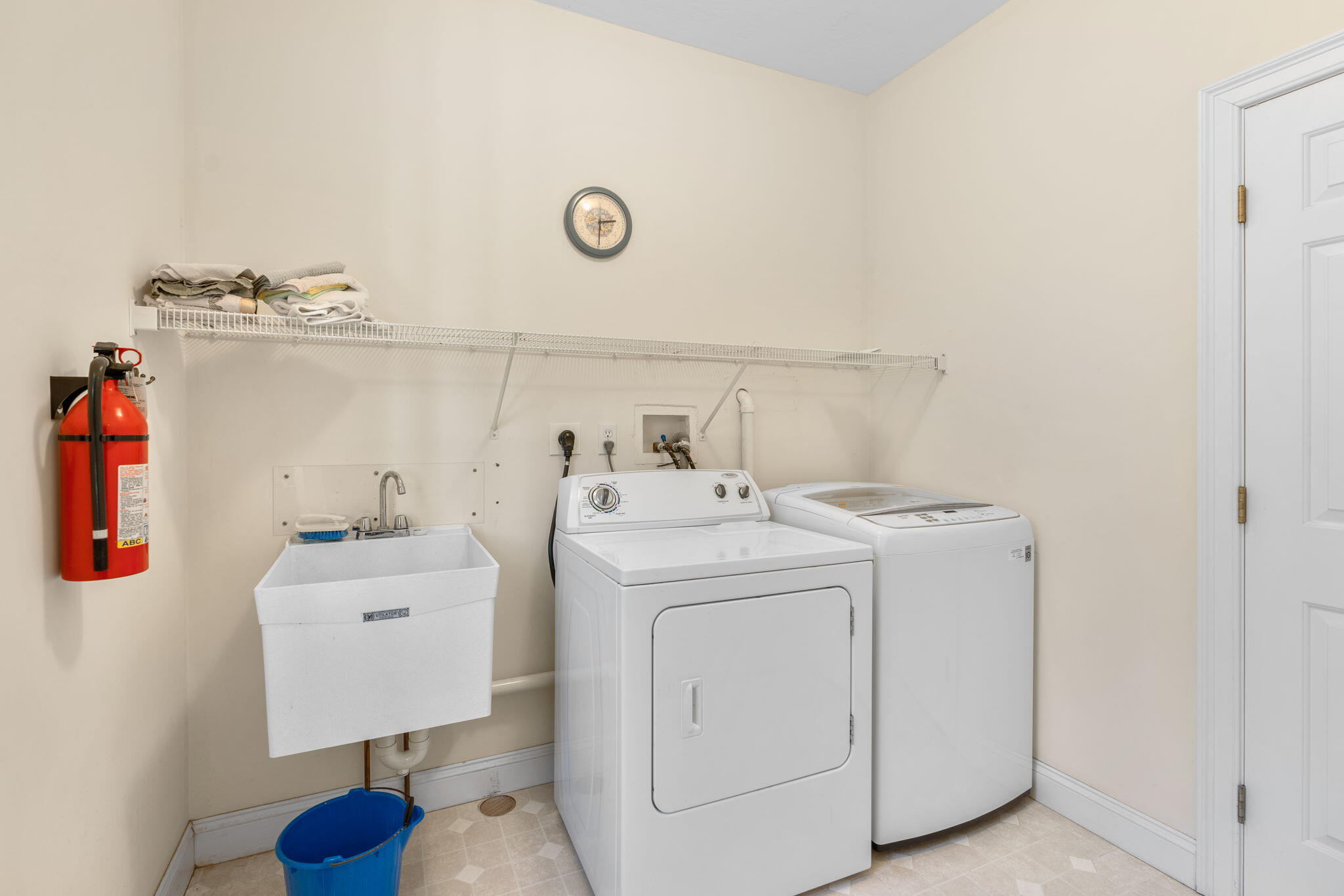 208 Rock Landing Road Mashpee, MA 02649 - Photo 18 of 32 a utility room with dryer and washer