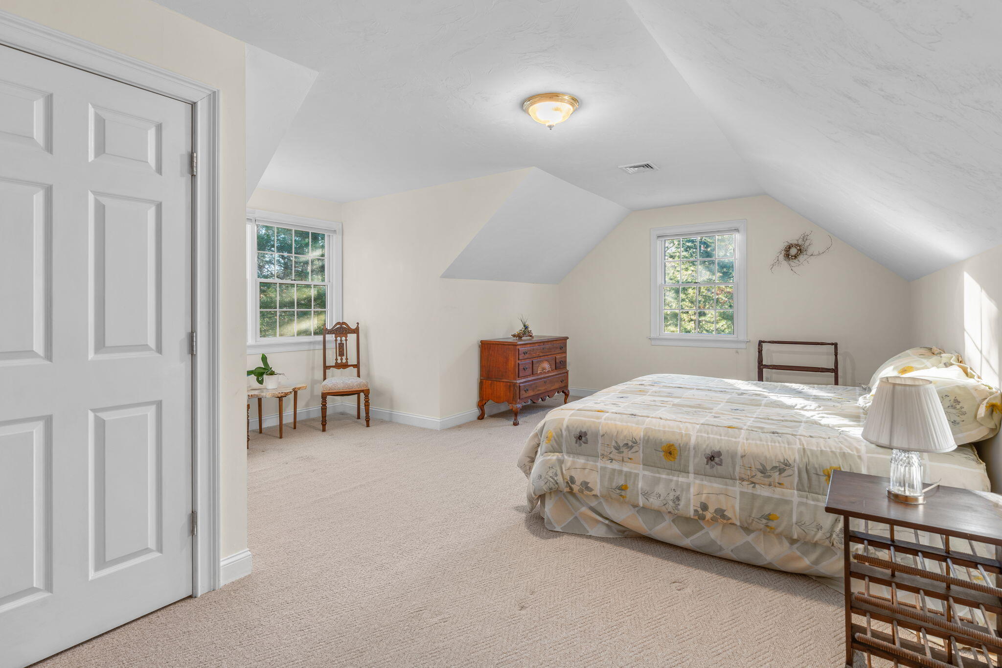 208 Rock Landing Road Mashpee, MA 02649 - Photo 26 of 32 a bedroom with bed and window
