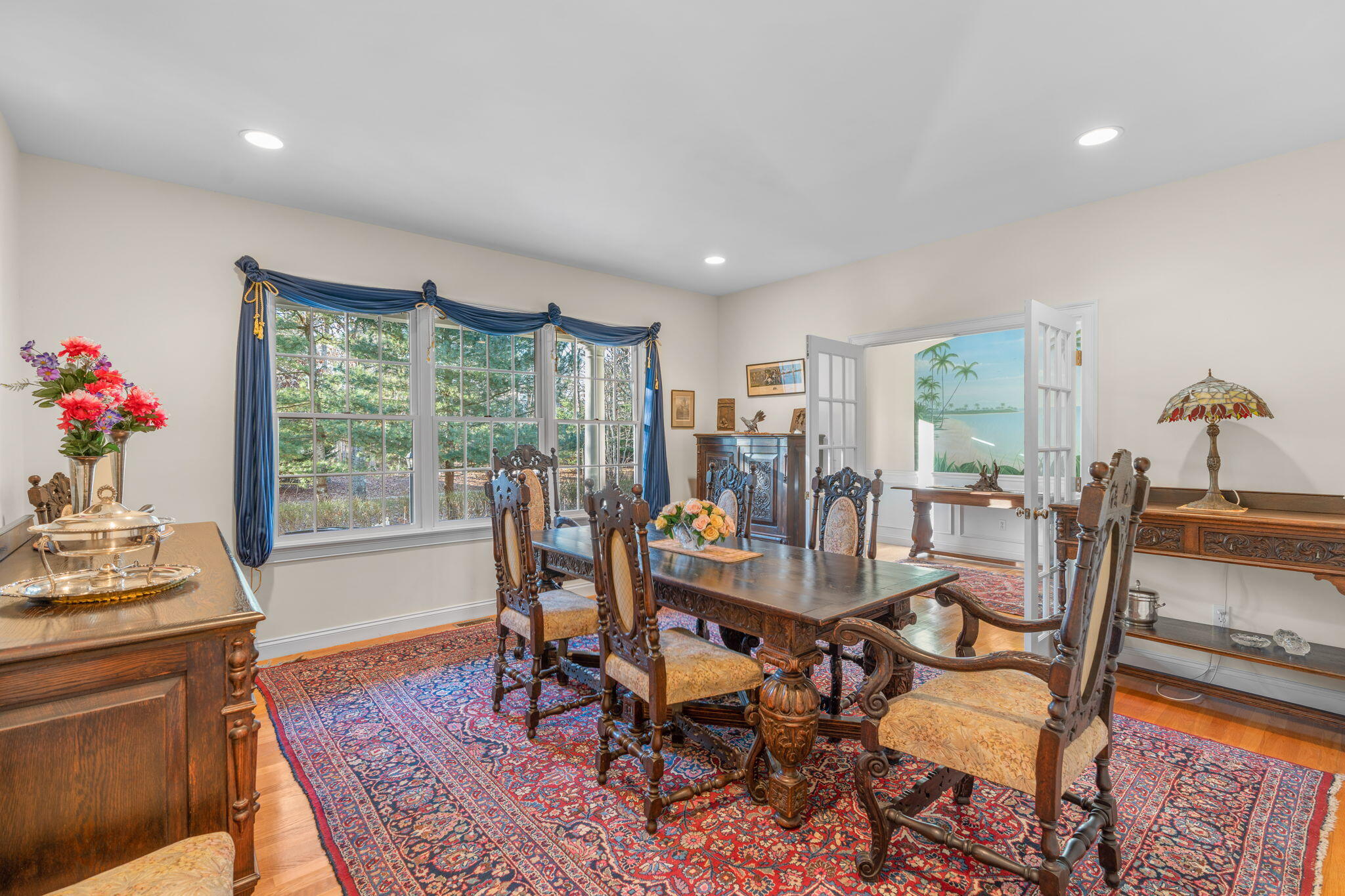 208 Rock Landing Road Mashpee, MA 02649 - Photo 7 of 32 a view of a dining room with furniture window and wooden floor