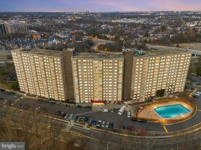 a front view of a building with a street