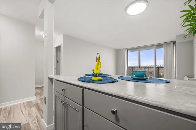 a kitchen with a sink and a window