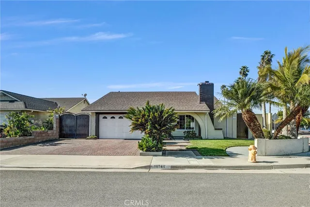 front view of a house with a street