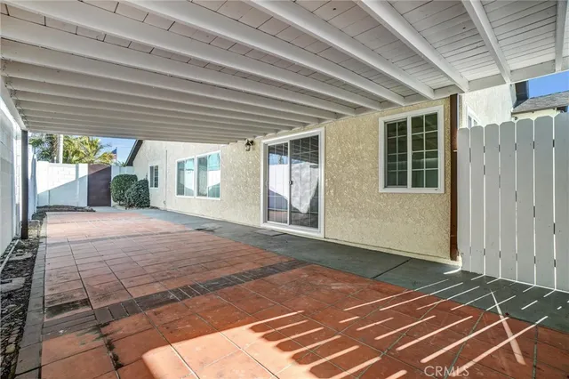 a view of a backyard of a house