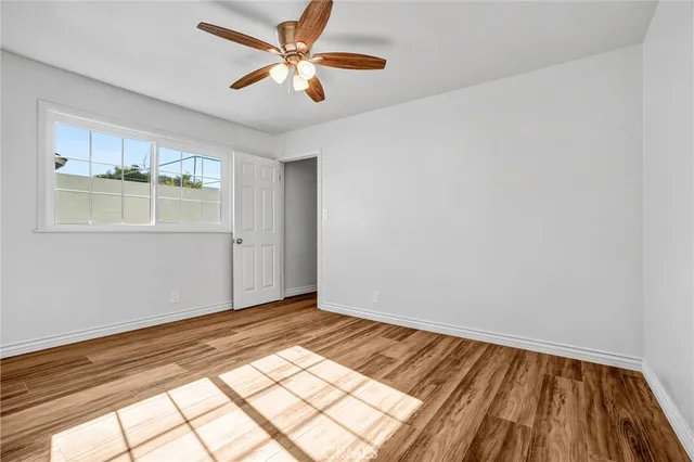 a view of an empty room and window