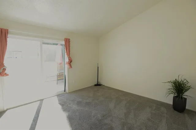a bathroom with a sink mirror and toilet