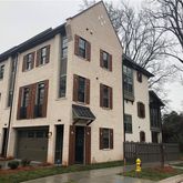 a front view of a building with street view
