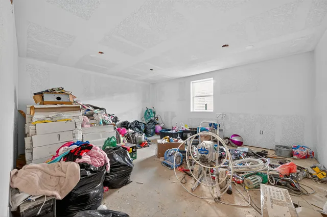 a bathroom with a tub and shower