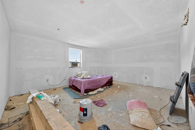 a view of a storage & utility room with closet