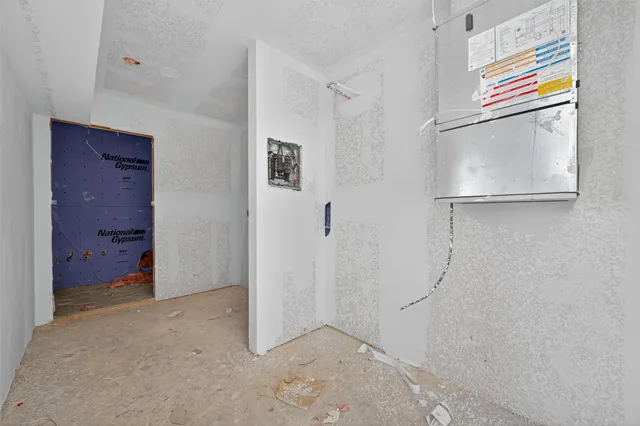 a room with a couch and window