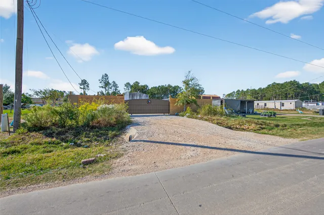 a view of a back yard of the house