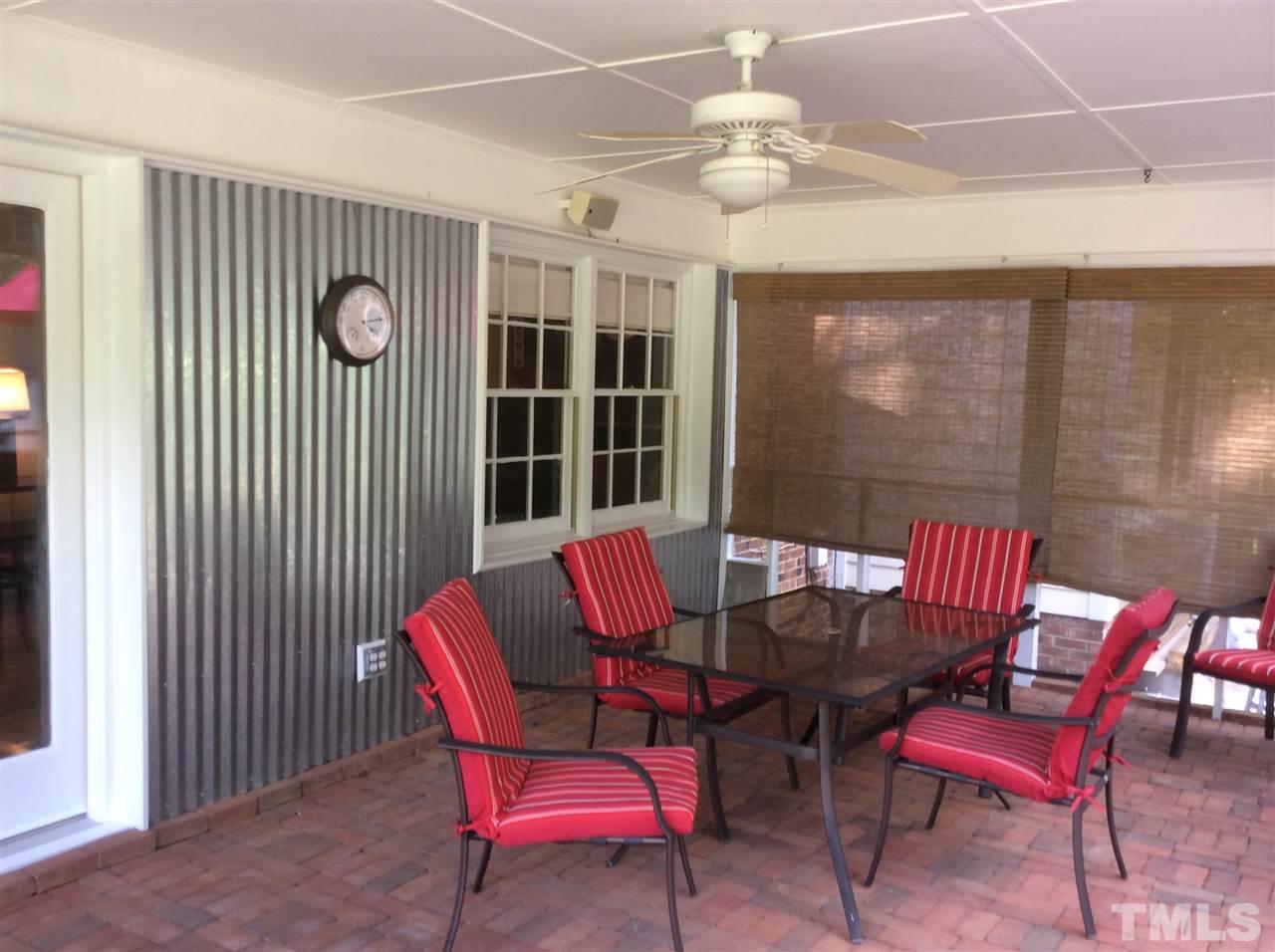 1013 Deerfield Road Raleigh, NC 27609 - Photo 11 of 25 a view of a dining room with furniture window and outside view