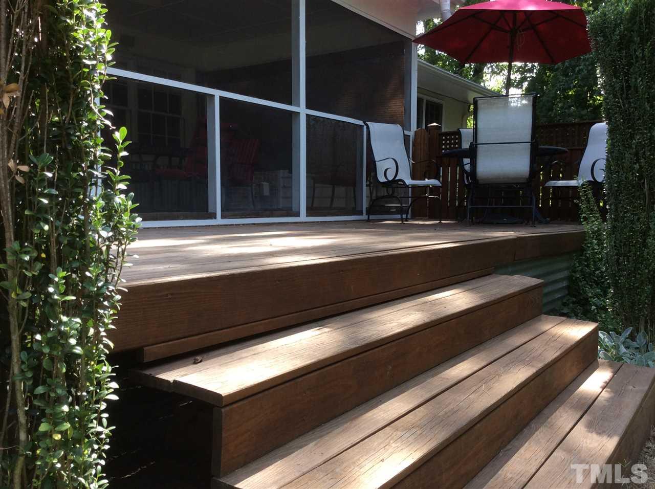 1013 Deerfield Road Raleigh, NC 27609 - Photo 14 of 25 a view of a house with a patio