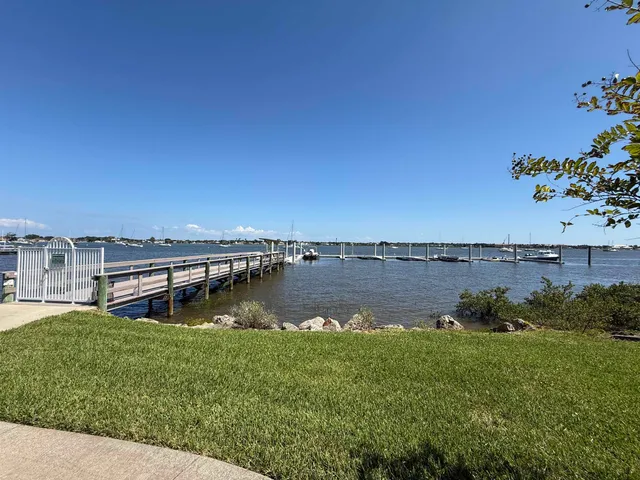a view of a lake with a big yard