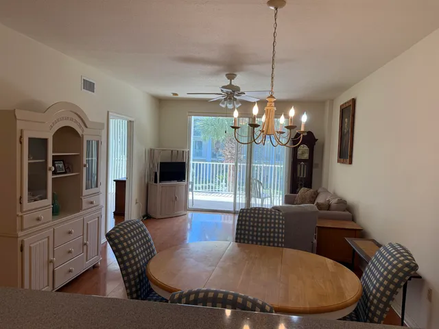 a view of a livingroom with furniture and window