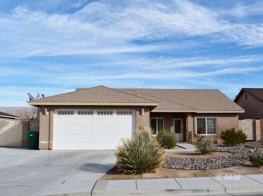 412 Abigail Street Ridgecrest, CA 93555 - Photo 1 of 14 front view of a house with a pathway