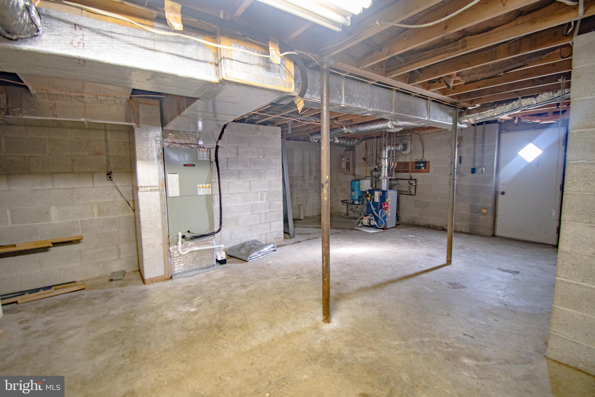618 Pigpen Point Road Queenstown, MD 21658 - Photo 42 of 42 Basement with interior and exterior access
