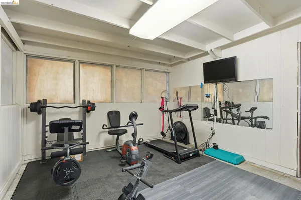 a view of a room with gym equipment
