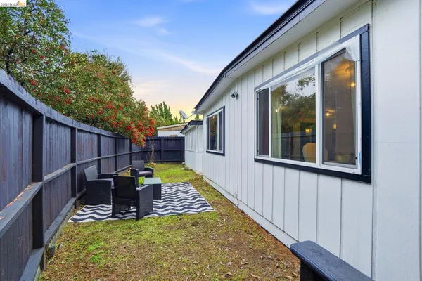 a view of a deck with a backyard