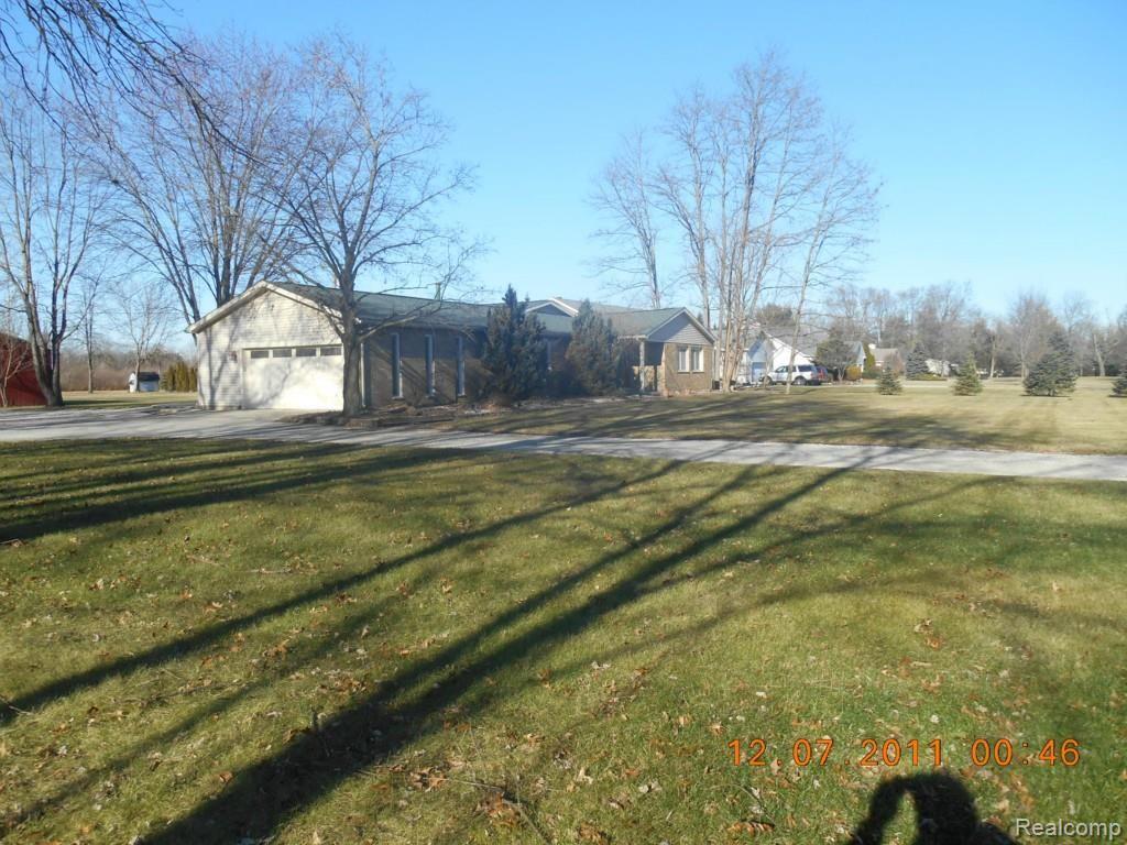 15200 Haggerty Road Belleville, MI 48111 - Photo 8 of 99 LOOKING AT FRONT YARD AND HOME FROM SOUTH LOT LINE