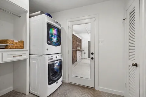 a utility room with washer and dryer