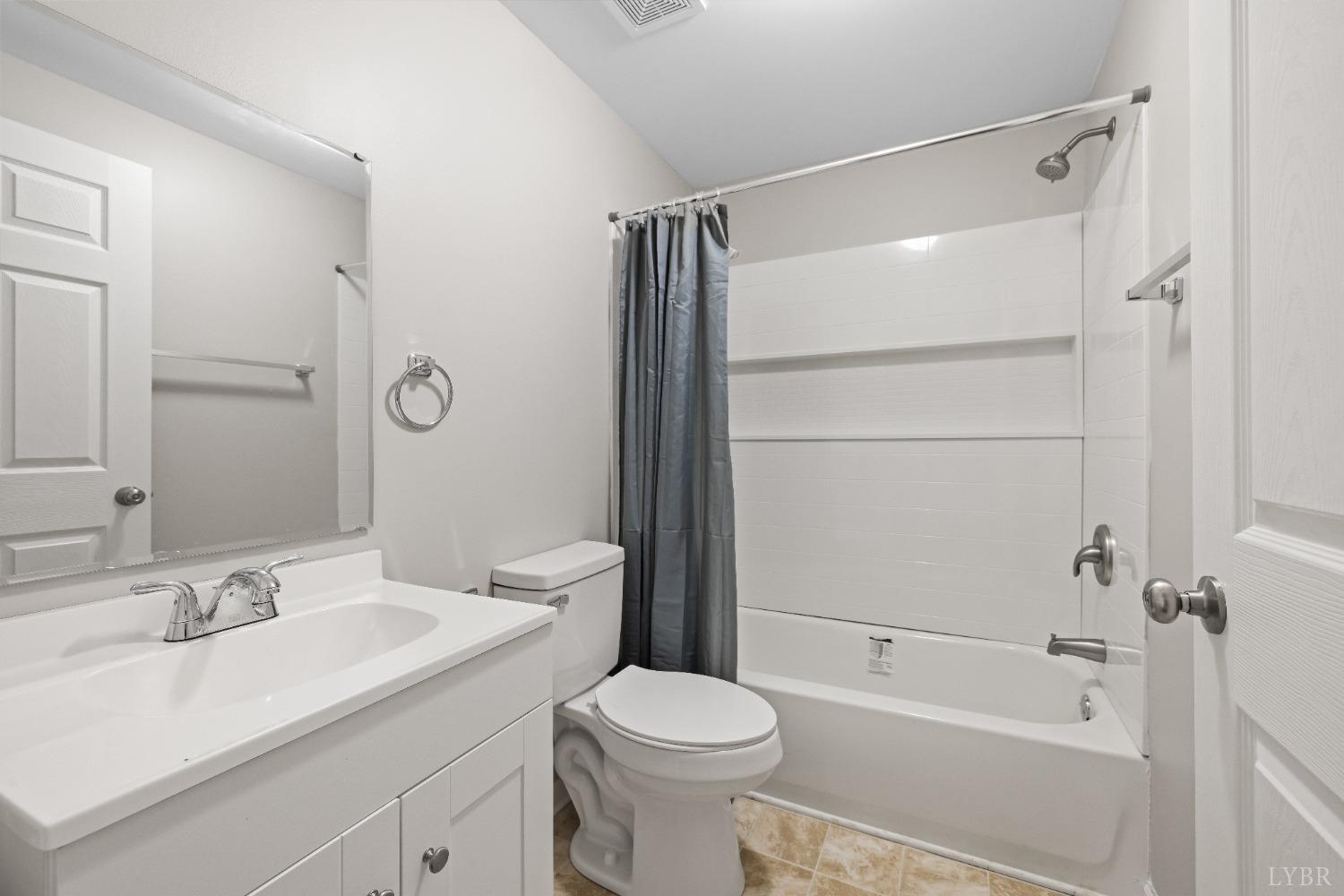 3936 Goodview Road Goodview, VA 24095 - Photo 17 of 29 a bathroom with a sink toilet and shower