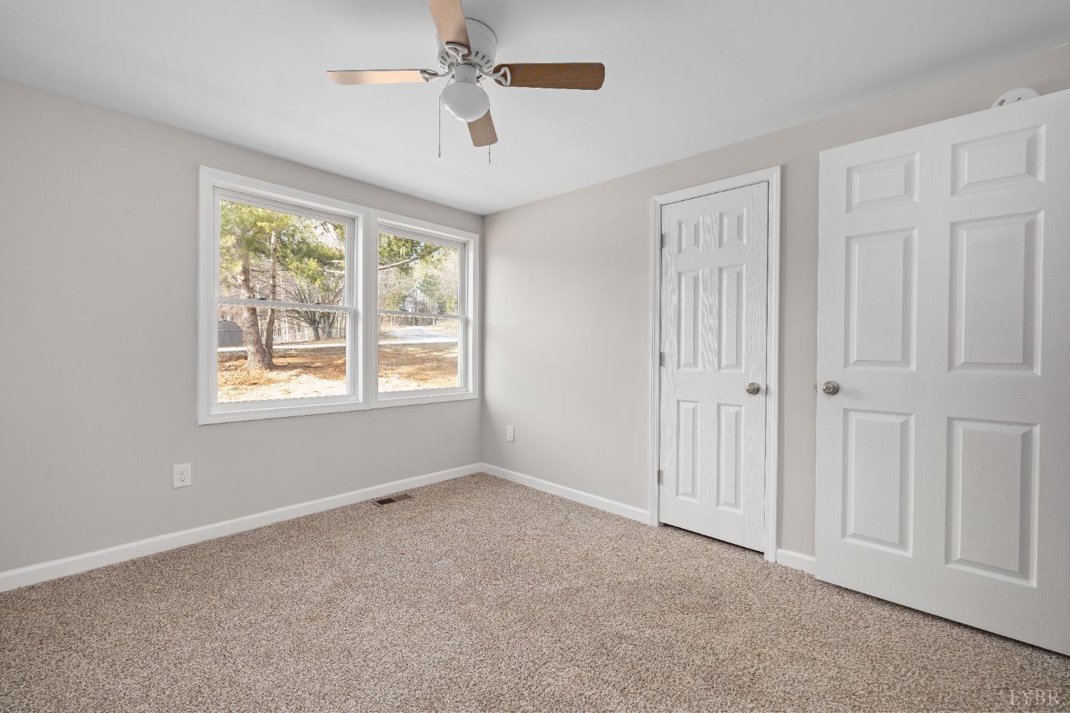3936 Goodview Road Goodview, VA 24095 - Photo 19 of 29 a view of an empty room with a window