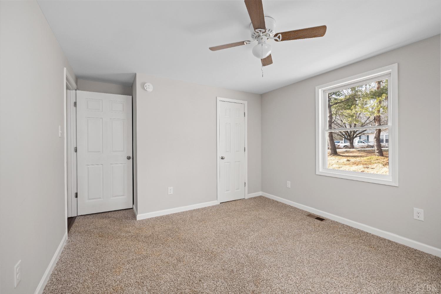 3936 Goodview Road Goodview, VA 24095 - Photo 21 of 29 a view of an empty room with a window