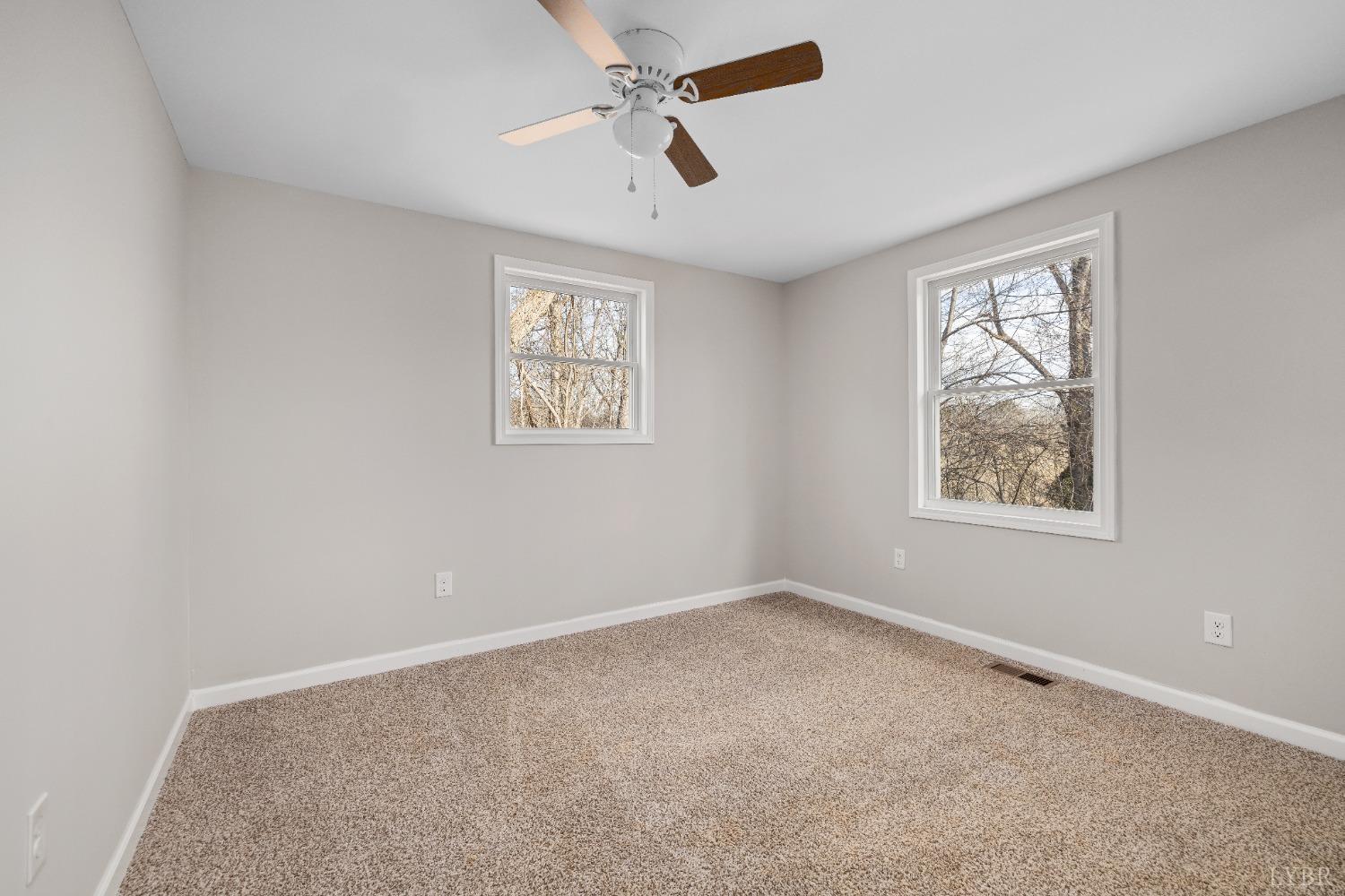 3936 Goodview Road Goodview, VA 24095 - Photo 22 of 29 a view of an empty room with a window