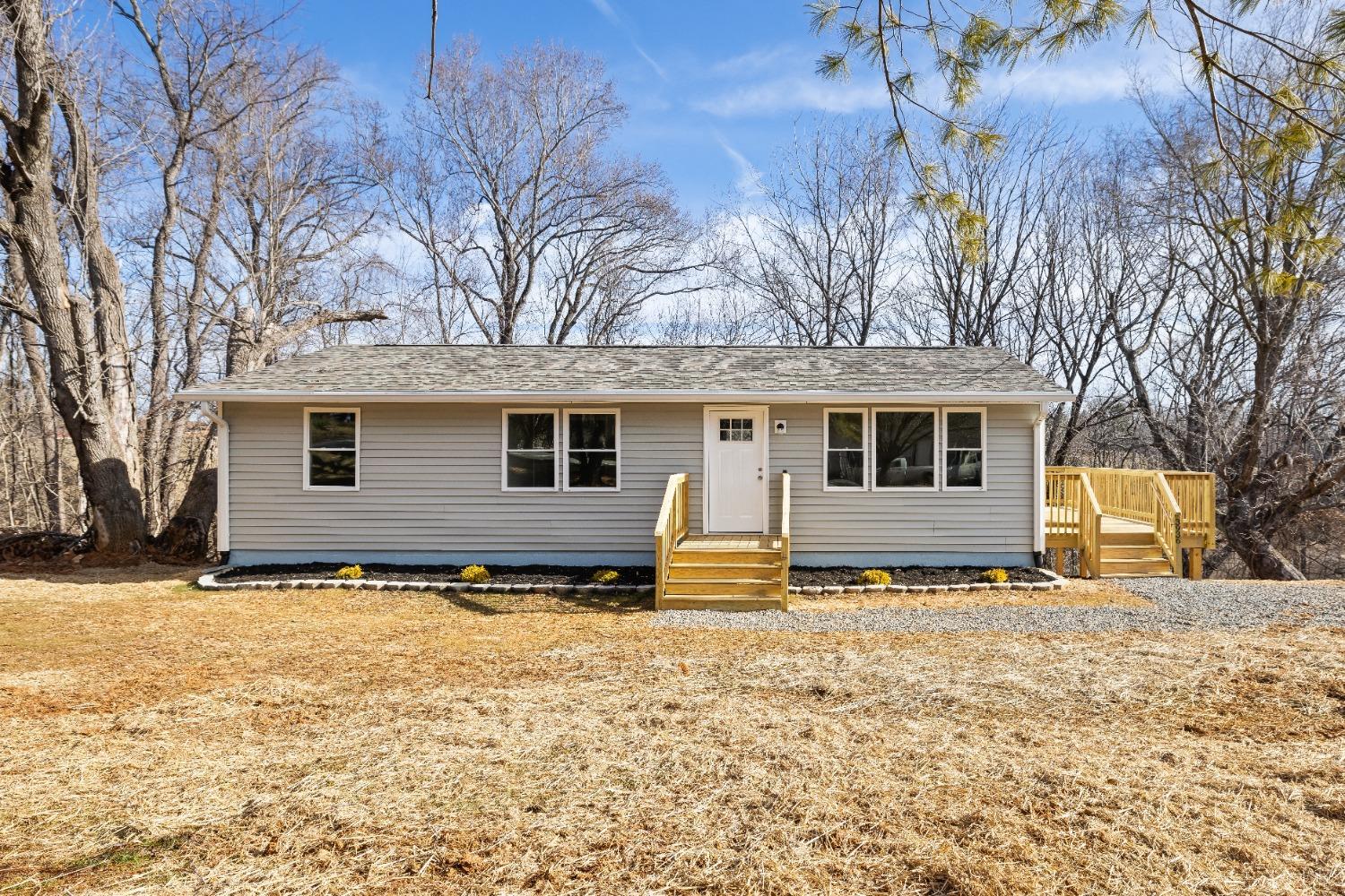 3936 Goodview Road Goodview, VA 24095 - Photo 4 of 29 a front view of a house with a yard