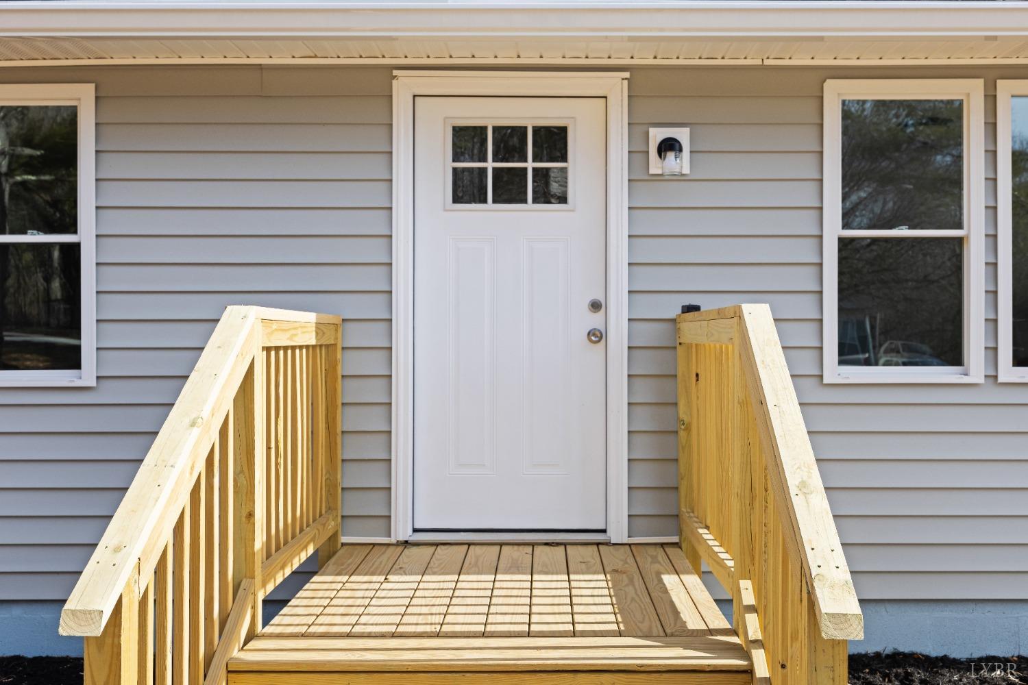 3936 Goodview Road Goodview, VA 24095 - Photo 5 of 29 a view of deck with a door