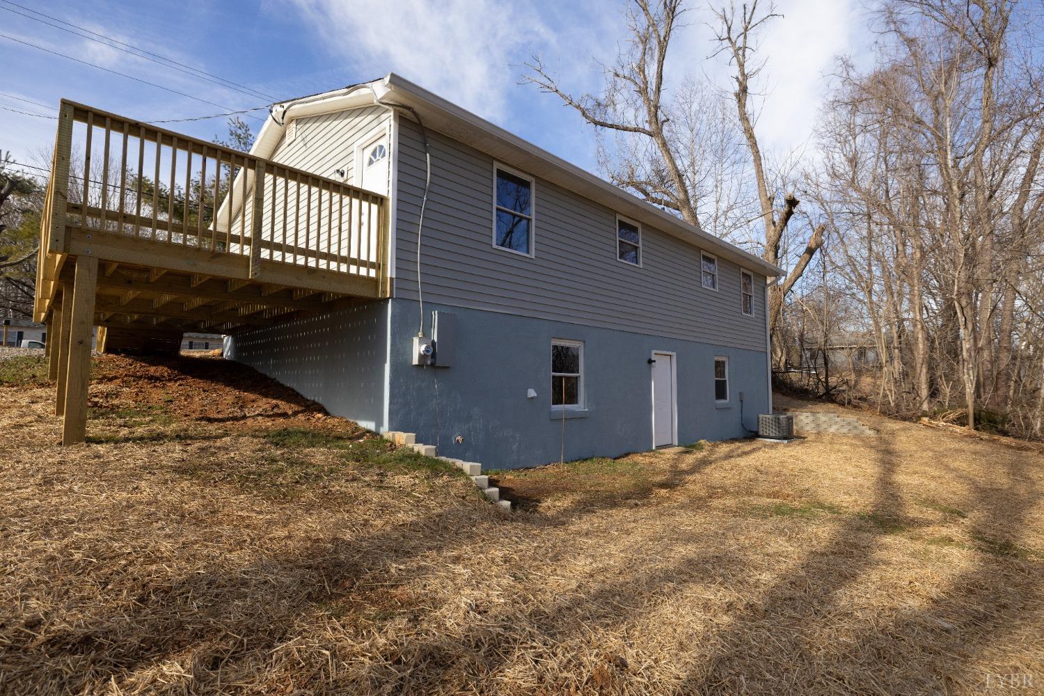 3936 Goodview Road Goodview, VA 24095 - Photo 10 of 29 a view of a house with a fence