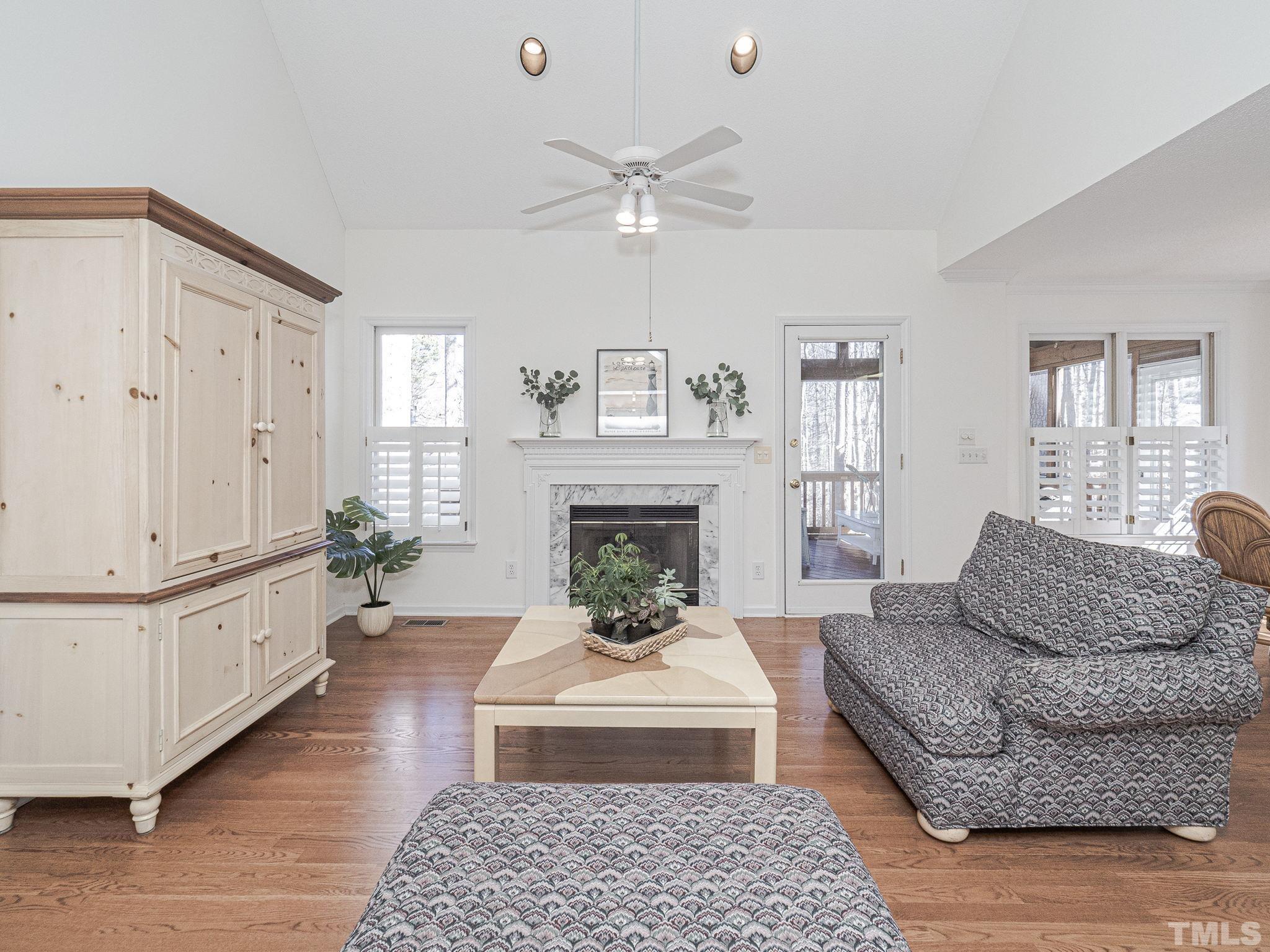 106 Kingsmill Road Cary, NC 27511 - Photo 13 of 31 a living room with furniture and a fireplace