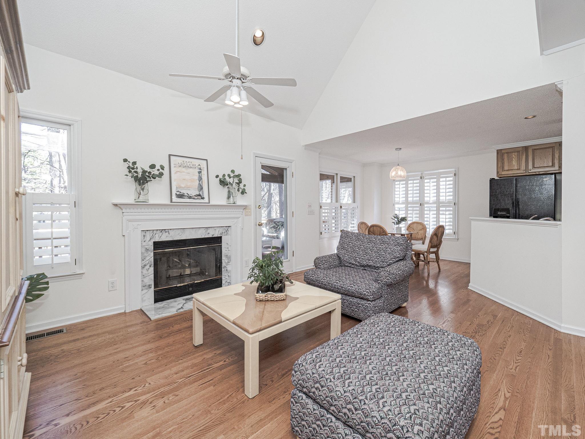 106 Kingsmill Road Cary, NC 27511 - Photo 14 of 31 a living room with furniture and a fireplace