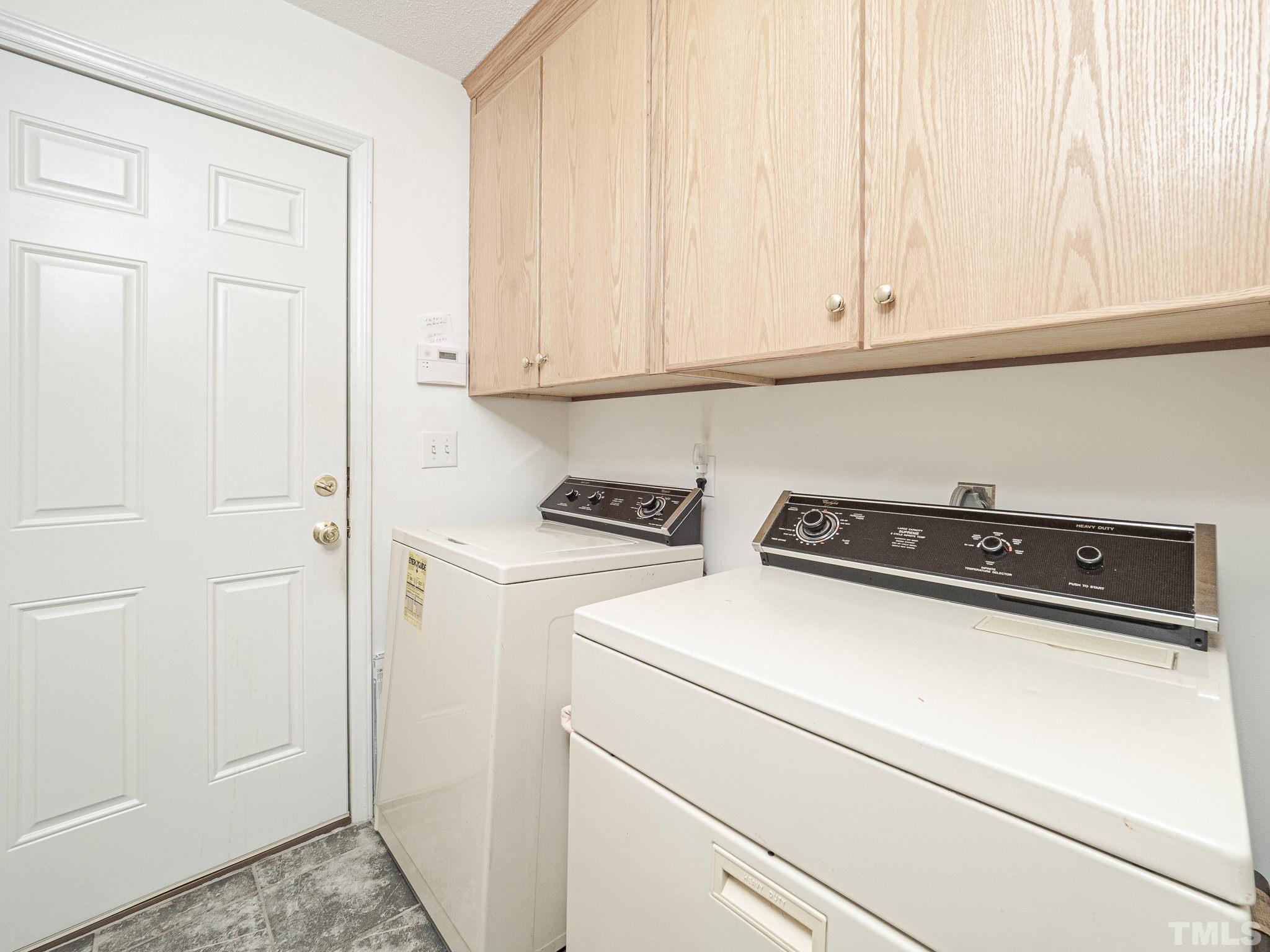 106 Kingsmill Road Cary, NC 27511 - Photo 16 of 31 a close view of washer and dryer