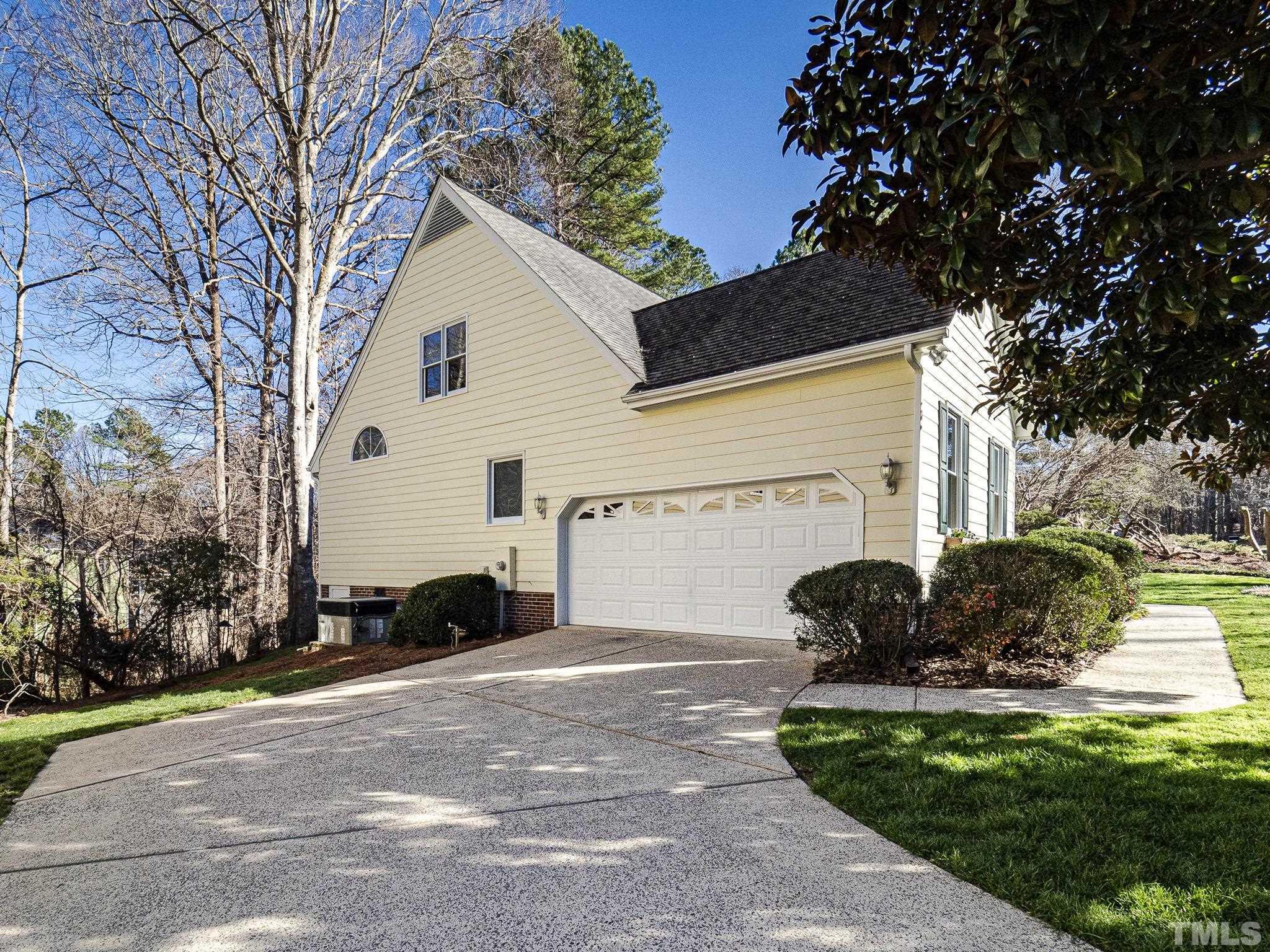 106 Kingsmill Road Cary, NC 27511 - Photo 2 of 31 a view of a house with backyard and trees